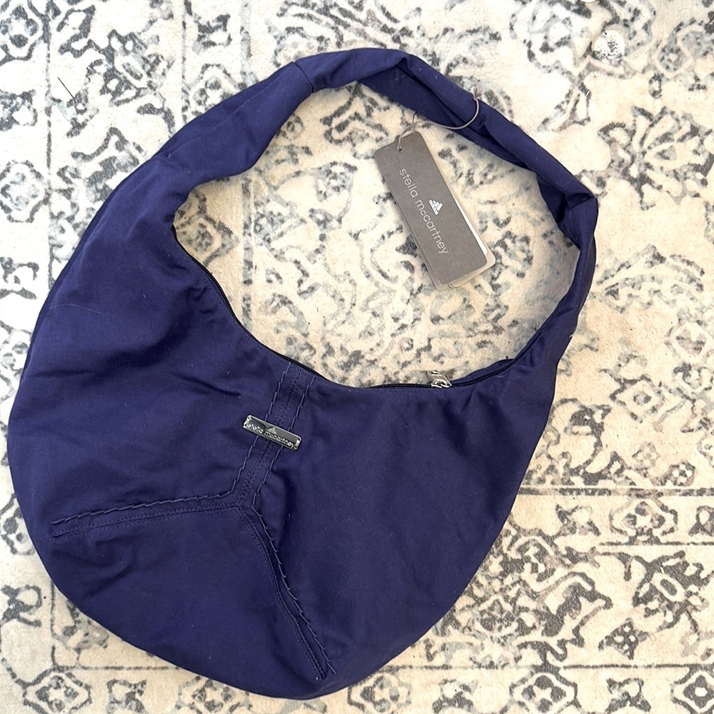 Lightweight, packable shoulder bag by Stella McCartney for Adidas.